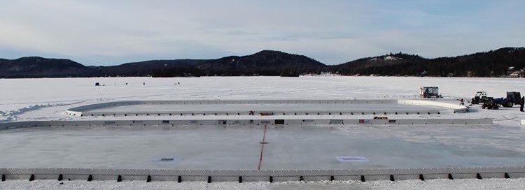 Ice skating rinks being made on the frozen lake