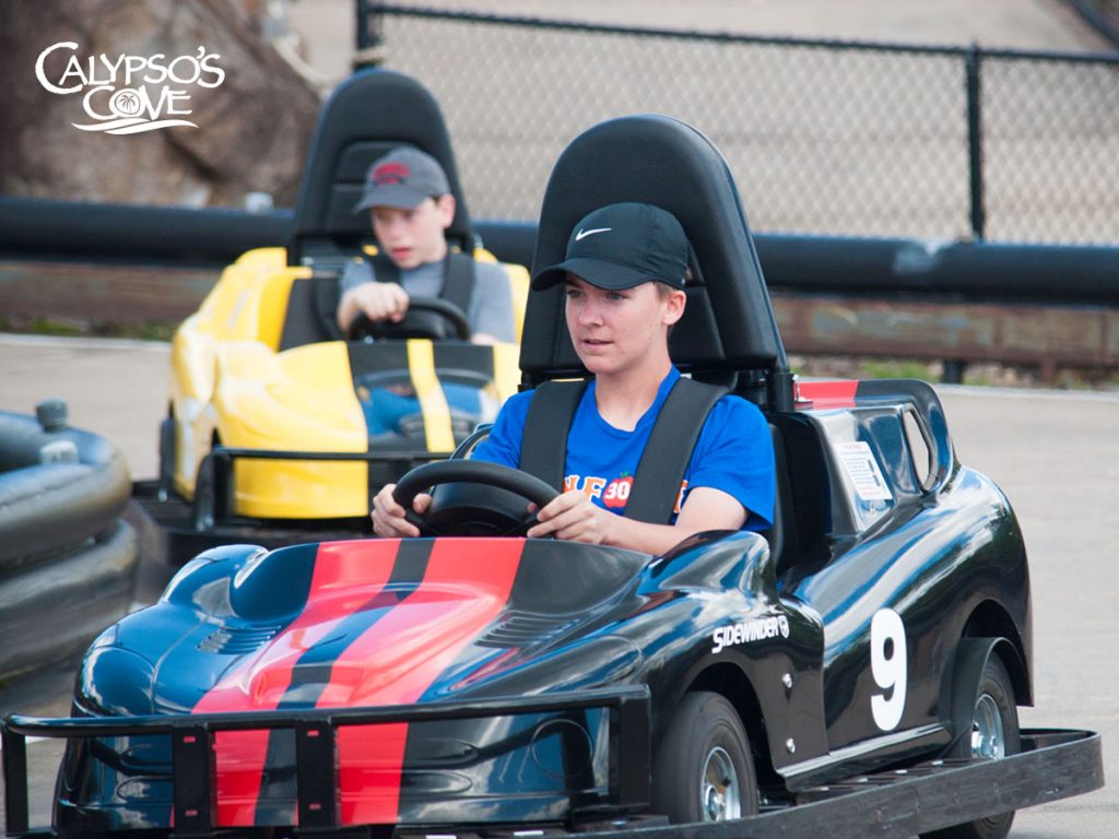 boys race go karts at Calypso's Cove