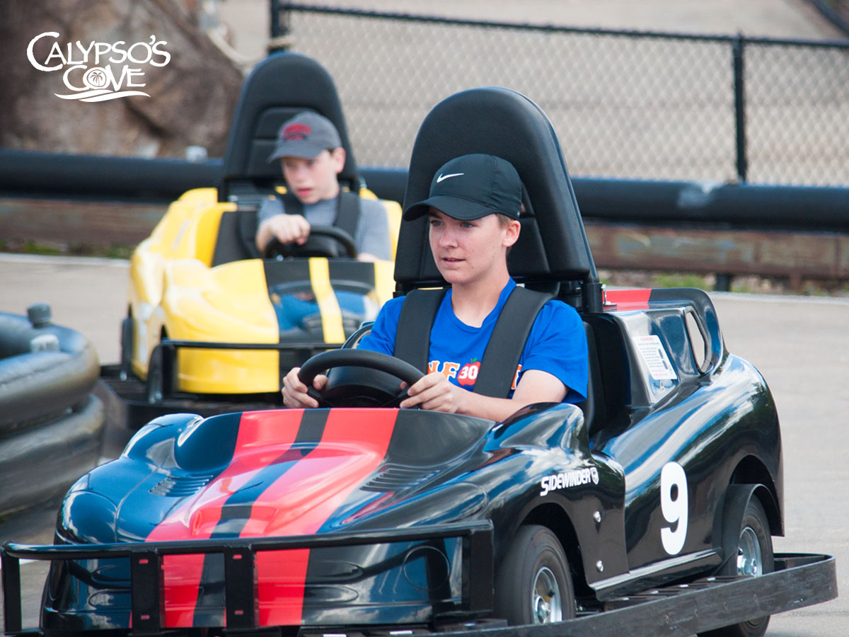 boys race go karts at Calypso's Cove