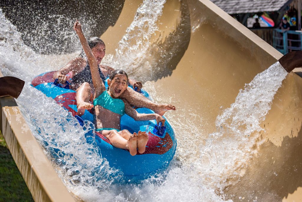 2 girls on the Rondaxe Run water ride at Water Safari